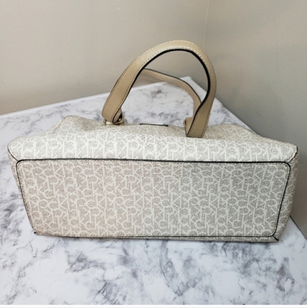 Calvin Klein Large Almond Monogram Satchel - Like New | Metallic Gold & Cream - Picture 15 of 16